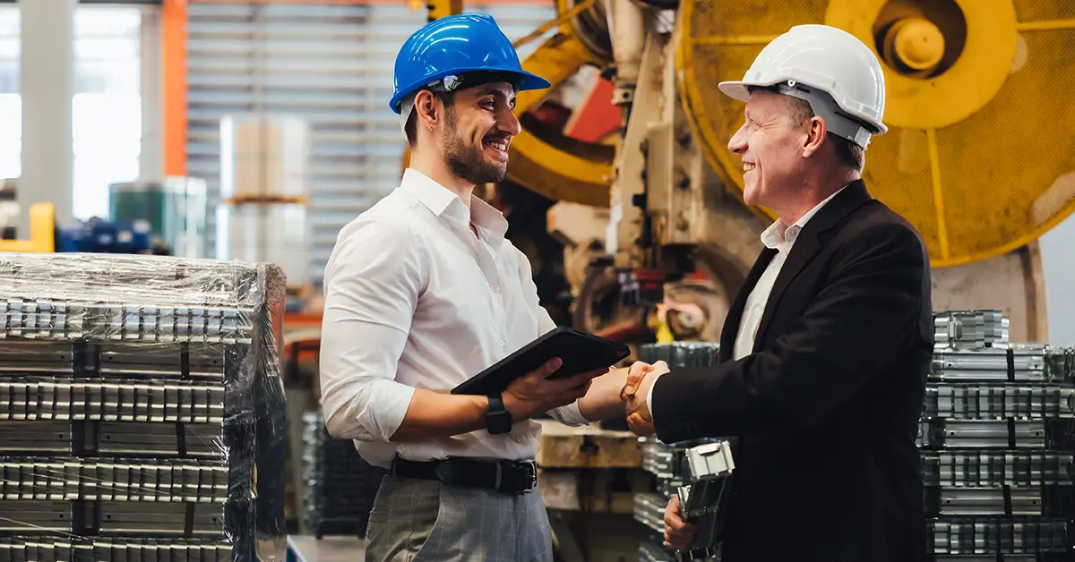 shaking hands on business cooperation agreement