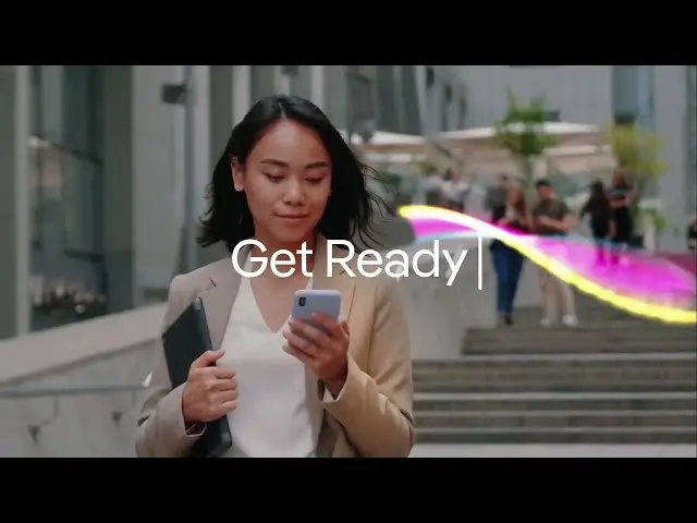 Confident businesswoman walking down city steps, holding a tablet and checking her phone, with "Get Ready" text and a colorful digital wave behind her.